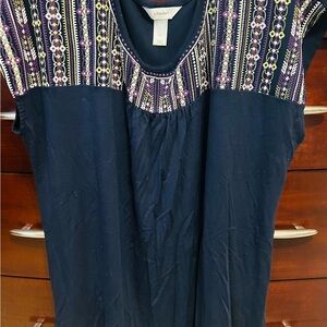 Woman’s sleeveless top with contrast around neckline. Navy. Size 1X